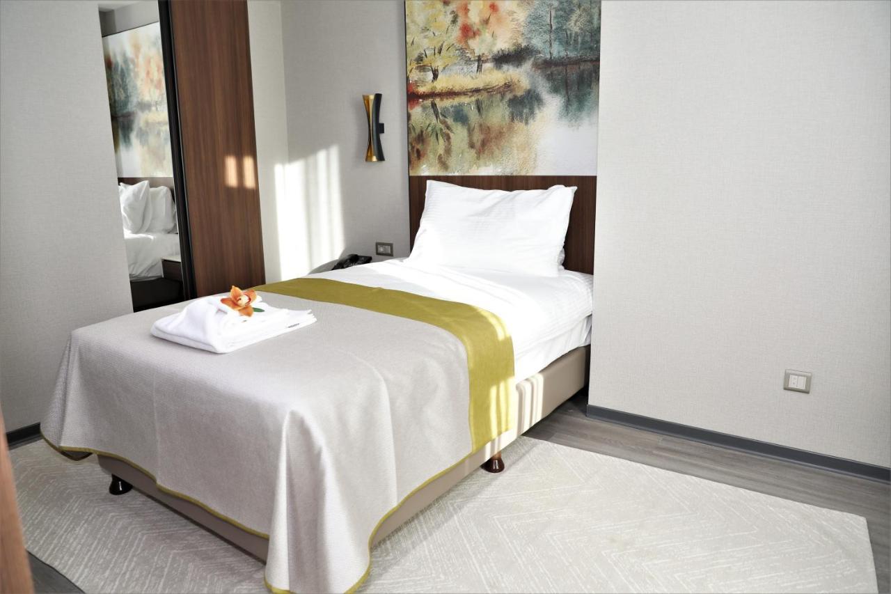 Limak Skopje Luxury Hotel Luaran gambar A single bed